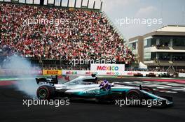 Lewis Hamilton (GBR) Mercedes AMG F1 W08 celebrates winning the World Championship in parc ferme. 29.10.2017. Formula 1 World Championship, Rd 18, Mexican Grand Prix, Mexico City, Mexico, Race Day.