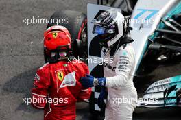 (L to R): Kimi Raikkonen (FIN) Ferrari with Valtteri Bottas (FIN) Mercedes AMG F1 in parc ferme. 29.10.2017. Formula 1 World Championship, Rd 18, Mexican Grand Prix, Mexico City, Mexico, Race Day.