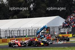 Sebastian Vettel (GER) Ferrari SF70H, Max Verstappen (NLD) Red Bull Racing RB13, and Lewis Hamilton (GBR) Mercedes AMG F1 W08 battle for the lead at the start of the race. 29.10.2017. Formula 1 World Championship, Rd 18, Mexican Grand Prix, Mexico City, Mexico, Race Day.