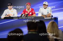 (L to R): Max Verstappen (NLD) Red Bull Racing; Sebastian Vettel (GER) Ferrari; Lewis Hamilton (GBR) Mercedes AMG F1, in the post qualifying FIA Press Conference. 28.10.2017. Formula 1 World Championship, Rd 18, Mexican Grand Prix, Mexico City, Mexico, Qualifying Day.