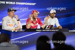 (L to R): Max Verstappen (NLD) Red Bull Racing; Sebastian Vettel (GER) Ferrari; Lewis Hamilton (GBR) Mercedes AMG F1, in the post qualifying FIA Press Conference. 28.10.2017. Formula 1 World Championship, Rd 18, Mexican Grand Prix, Mexico City, Mexico, Qualifying Day.