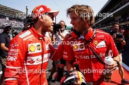 Sebastian Vettel (GER) Ferrari with Antti Kontsas (FIN) Personal Trainer, in qualifying parc ferme.                                28.10.2017. Formula 1 World Championship, Rd 18, Mexican Grand Prix, Mexico City, Mexico, Qualifying Day.