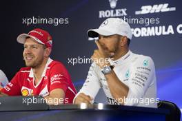 (L to R): Sebastian Vettel (GER) Ferrari and Lewis Hamilton (GBR) Mercedes AMG F1 in the post qualifying FIA Press Conference. 28.10.2017. Formula 1 World Championship, Rd 18, Mexican Grand Prix, Mexico City, Mexico, Qualifying Day.