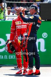 (L to R): Sebastian Vettel (GER) Ferrari with Max Verstappen (NLD) Red Bull Racing in qualifying parc ferme. 28.10.2017. Formula 1 World Championship, Rd 18, Mexican Grand Prix, Mexico City, Mexico, Qualifying Day.