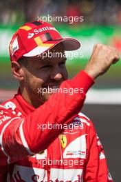Sebastian Vettel (GER) Ferrari celebrates his pole position in qualifying parc ferme. 28.10.2017. Formula 1 World Championship, Rd 18, Mexican Grand Prix, Mexico City, Mexico, Qualifying Day.