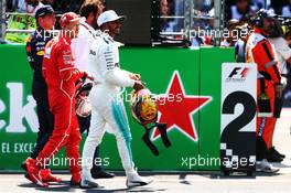 (L to R): Max Verstappen (NLD) Red Bull Racing with Sebastian Vettel (GER) Ferrari and Lewis Hamilton (GBR) Mercedes AMG F1 in qualifying parc ferme. 28.10.2017. Formula 1 World Championship, Rd 18, Mexican Grand Prix, Mexico City, Mexico, Qualifying Day.