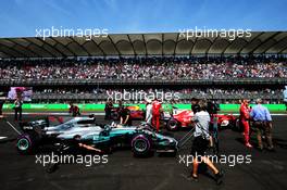 Lewis Hamilton (GBR) Mercedes AMG F1 and Sebastian Vettel (GER) Ferrari in qualifying parc ferme. 28.10.2017. Formula 1 World Championship, Rd 18, Mexican Grand Prix, Mexico City, Mexico, Qualifying Day.