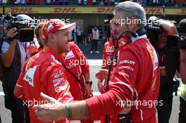Sebastian Vettel (GER) Ferrari SF70H and Maurizio Arrivabene (ITA) Ferrari Team Principal. 28.10.2017. Formula 1 World Championship, Rd 18, Mexican Grand Prix, Mexico City, Mexico, Qualifying Day.
