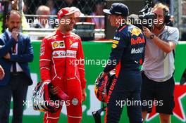 (L to R): Sebastian Vettel (GER) Ferrari with Max Verstappen (NLD) Red Bull Racing in qualifying parc ferme. 28.10.2017. Formula 1 World Championship, Rd 18, Mexican Grand Prix, Mexico City, Mexico, Qualifying Day.
