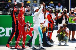 (L to R): Max Verstappen (NLD) Red Bull Racing with Sebastian Vettel (GER) Ferrari and Lewis Hamilton (GBR) Mercedes AMG F1 in qualifying parc ferme. 28.10.2017. Formula 1 World Championship, Rd 18, Mexican Grand Prix, Mexico City, Mexico, Qualifying Day.