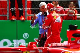 Sebastian Vettel (GER) Ferrari with Damon Hill (GBR) Sky Sports Presenter in qualifying parc ferme. 28.10.2017. Formula 1 World Championship, Rd 18, Mexican Grand Prix, Mexico City, Mexico, Qualifying Day.