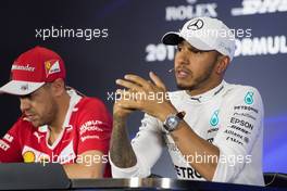 (L to R): Sebastian Vettel (GER) Ferrari and Lewis Hamilton (GBR) Mercedes AMG F1 in the post qualifying FIA Press Conference. 28.10.2017. Formula 1 World Championship, Rd 18, Mexican Grand Prix, Mexico City, Mexico, Qualifying Day.