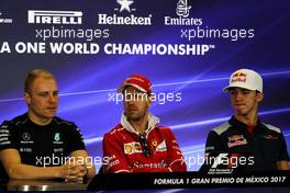 (L to R): Valtteri Bottas (FIN) Mercedes AMG F1 with Sebastian Vettel (GER) Ferrari, and Pierre Gasly (FRA) Scuderia Toro Rosso, in the FIA Press Conference. 26.10.2017. Formula 1 World Championship, Rd 18, Mexican Grand Prix, Mexico City, Mexico, Preparation Day.