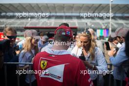 Kimi Raikkonen (FIN) Ferrari signs autographs for the fans. 26.10.2017. Formula 1 World Championship, Rd 18, Mexican Grand Prix, Mexico City, Mexico, Preparation Day.