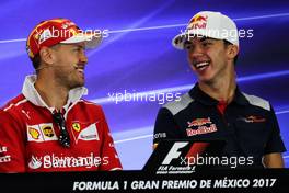 (L to R): Sebastian Vettel (GER) Ferrari and Pierre Gasly (FRA) Scuderia Toro Rosso in the FIA Press Conference. 26.10.2017. Formula 1 World Championship, Rd 18, Mexican Grand Prix, Mexico City, Mexico, Preparation Day.
