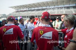 (L to R): Kimi Raikkonen (FIN) Ferrari and team mate Sebastian Vettel (GER) Ferrari sign autographs for the fans. 26.10.2017. Formula 1 World Championship, Rd 18, Mexican Grand Prix, Mexico City, Mexico, Preparation Day.