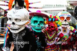 Day of the Dead costume wearers. 26.10.2017. Formula 1 World Championship, Rd 18, Mexican Grand Prix, Mexico City, Mexico, Preparation Day.
