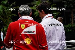 (L to R): Maurizio Arrivabene (ITA) Ferrari Team Principal with Toto Wolff (GER) Mercedes AMG F1 Shareholder and Executive Director. 29.09.2017. Formula 1 World Championship, Rd 15, Malaysian Grand Prix, Sepang, Malaysia, Friday.
