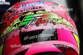 The helmet of Sergio Perez (MEX) Sahara Force India F1 with support for the victims of the Mexico earthquake. 29.09.2017. Formula 1 World Championship, Rd 15, Malaysian Grand Prix, Sepang, Malaysia, Friday.
