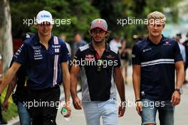 (L to R): Esteban Ocon (FRA) Sahara Force India F1 Team with Carlos Sainz Jr (ESP) Scuderia Toro Rosso and Marcus Ericsson (SWE) Sauber F1 Team. 29.09.2017. Formula 1 World Championship, Rd 15, Malaysian Grand Prix, Sepang, Malaysia, Friday.