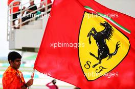 A Ferrari fan with a flag. 29.09.2017. Formula 1 World Championship, Rd 15, Malaysian Grand Prix, Sepang, Malaysia, Friday.