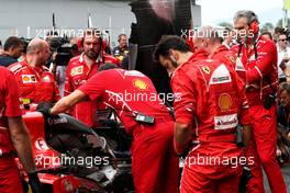 The Ferrari SF70H of Kimi Raikkonen (FIN) Ferrari with a problem on the grid. 01.10.2017. Formula 1 World Championship, Rd 15, Malaysian Grand Prix, Sepang, Malaysia, Sunday.