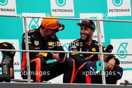 (L to R): Race winner Max Verstappen (NLD) Red Bull Racing on the podium with third placed team mate Daniel Ricciardo (AUS) Red Bull Racing. 01.10.2017. Formula 1 World Championship, Rd 15, Malaysian Grand Prix, Sepang, Malaysia, Sunday.