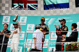 The podium (L to R): Lewis Hamilton (GBR) Mercedes AMG F1, second; Max Verstappen (NLD) Red Bull Racing, race winner; Daniel Ricciardo (AUS) Red Bull Racing, third. 01.10.2017. Formula 1 World Championship, Rd 15, Malaysian Grand Prix, Sepang, Malaysia, Sunday.