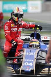 Sebastian Vettel (GER) Ferrari SF70H gets a lift to the pits  01.10.2017. Formula 1 World Championship, Rd 15, Malaysian Grand Prix, Sepang, Malaysia, Sunday.