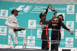 1st place Max Verstappen (NLD) Red Bull Racing with 2nd place Lewis Hamilton (GBR) Mercedes AMG F1 W08 and 3rd place Daniel Ricciardo (AUS) Red Bull Racing. 01.10.2017. Formula 1 World Championship, Rd 15, Malaysian Grand Prix, Sepang, Malaysia, Sunday.