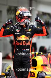 Race winner Max Verstappen (NLD) Red Bull Racing RB13 celebrates in parc ferme. 01.10.2017. Formula 1 World Championship, Rd 15, Malaysian Grand Prix, Sepang, Malaysia, Sunday.