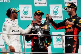The podium (L to R): Lewis Hamilton (GBR) Mercedes AMG F1, second; Max Verstappen (NLD) Red Bull Racing, race winner; Daniel Ricciardo (AUS) Red Bull Racing, third. 01.10.2017. Formula 1 World Championship, Rd 15, Malaysian Grand Prix, Sepang, Malaysia, Sunday.