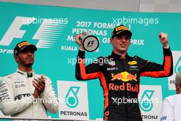 The podium (L to R): second placed Lewis Hamilton (GBR) Mercedes AMG F1 with race winner Max Verstappen (NLD) Red Bull Racing. 01.10.2017. Formula 1 World Championship, Rd 15, Malaysian Grand Prix, Sepang, Malaysia, Sunday.