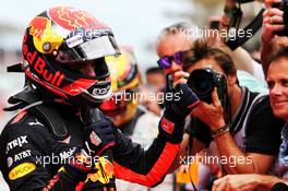 Race winner Max Verstappen (NLD) Red Bull Racing celebrates with the team in parc ferme. 01.10.2017. Formula 1 World Championship, Rd 15, Malaysian Grand Prix, Sepang, Malaysia, Sunday.