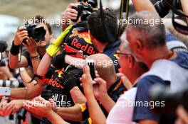 Race winner Max Verstappen (NLD) Red Bull Racing celebrates with the team in parc ferme. 01.10.2017. Formula 1 World Championship, Rd 15, Malaysian Grand Prix, Sepang, Malaysia, Sunday.