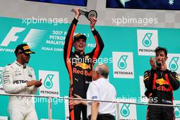 The podium (L to R): Lewis Hamilton (GBR) Mercedes AMG F1, second; Max Verstappen (NLD) Red Bull Racing, race winner; Daniel Ricciardo (AUS) Red Bull Racing, third. 01.10.2017. Formula 1 World Championship, Rd 15, Malaysian Grand Prix, Sepang, Malaysia, Sunday.