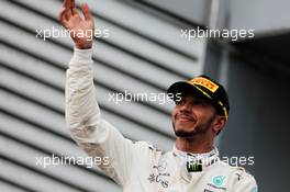 Lewis Hamilton (GBR) Mercedes AMG F1 celebrates his second position on the podium. 01.10.2017. Formula 1 World Championship, Rd 15, Malaysian Grand Prix, Sepang, Malaysia, Sunday.