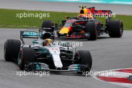 Lewis Hamilton (GBR) Mercedes AMG F1  and Max Verstappen (NLD) Red Bull Racing  01.10.2017. Formula 1 World Championship, Rd 15, Malaysian Grand Prix, Sepang, Malaysia, Sunday.