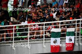 Fans in the grandstand and Mexican flags with a message of support following the earthquake. 30.09.2017. Formula 1 World Championship, Rd 15, Malaysian Grand Prix, Sepang, Malaysia, Saturday.