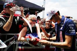 Esteban Ocon (FRA) Sahara Force India F1 Team signs autographs for the fans. 30.09.2017. Formula 1 World Championship, Rd 15, Malaysian Grand Prix, Sepang, Malaysia, Saturday.