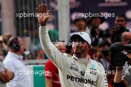 Lewis Hamilton (GBR) Mercedes AMG F1 celebrates his pole position in qualifying parc ferme. 30.09.2017. Formula 1 World Championship, Rd 15, Malaysian Grand Prix, Sepang, Malaysia, Saturday.