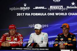 The post qualifying FIA Press Conference (L to R): Kimi Raikkonen (FIN) Ferrari; Lewis Hamilton (GBR) Mercedes AMG F1; Max Verstappen (NLD) Red Bull Racing. 30.09.2017. Formula 1 World Championship, Rd 15, Malaysian Grand Prix, Sepang, Malaysia, Saturday.