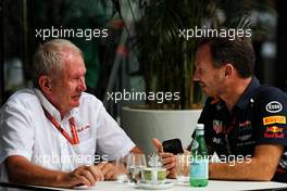 (L to R): Dr Helmut Marko (AUT) Red Bull Motorsport Consultant with Christian Horner (GBR) Red Bull Racing Team Principal. 30.09.2017. Formula 1 World Championship, Rd 15, Malaysian Grand Prix, Sepang, Malaysia, Saturday.
