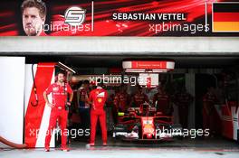 The Ferrari SF70H of Sebastian Vettel (GER) Ferrari SF70H in the pits during qualifying. 30.09.2017. Formula 1 World Championship, Rd 15, Malaysian Grand Prix, Sepang, Malaysia, Saturday.