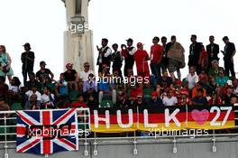 fans in the grandstand and flags for Jolyon Palmer (GBR) Renault Sport F1 Team and Nico Hulkenberg (GER) Renault Sport F1 Team. 30.09.2017. Formula 1 World Championship, Rd 15, Malaysian Grand Prix, Sepang, Malaysia, Saturday.