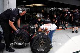 Mercedes AMG F1 tyres checked by a Scrutineer.