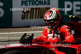 Kimi Raikkonen (FIN) Ferrari SF70H in qualifying parc ferme. 30.09.2017. Formula 1 World Championship, Rd 15, Malaysian Grand Prix, Sepang, Malaysia, Saturday.