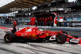 Sebastian Vettel (GER) Ferrari SF70H leaves the pits.                                30.09.2017. Formula 1 World Championship, Rd 15, Malaysian Grand Prix, Sepang, Malaysia, Saturday.