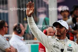 Lewis Hamilton (GBR) Mercedes AMG F1 celebrates his pole position in qualifying parc ferme. 30.09.2017. Formula 1 World Championship, Rd 15, Malaysian Grand Prix, Sepang, Malaysia, Saturday.