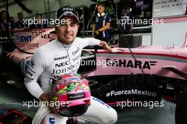 Sergio Perez (MEX) Sahara Force India F1 VJM10 with a message of support for Mexico after the recent earthquake. 30.09.2017. Formula 1 World Championship, Rd 15, Malaysian Grand Prix, Sepang, Malaysia, Saturday.